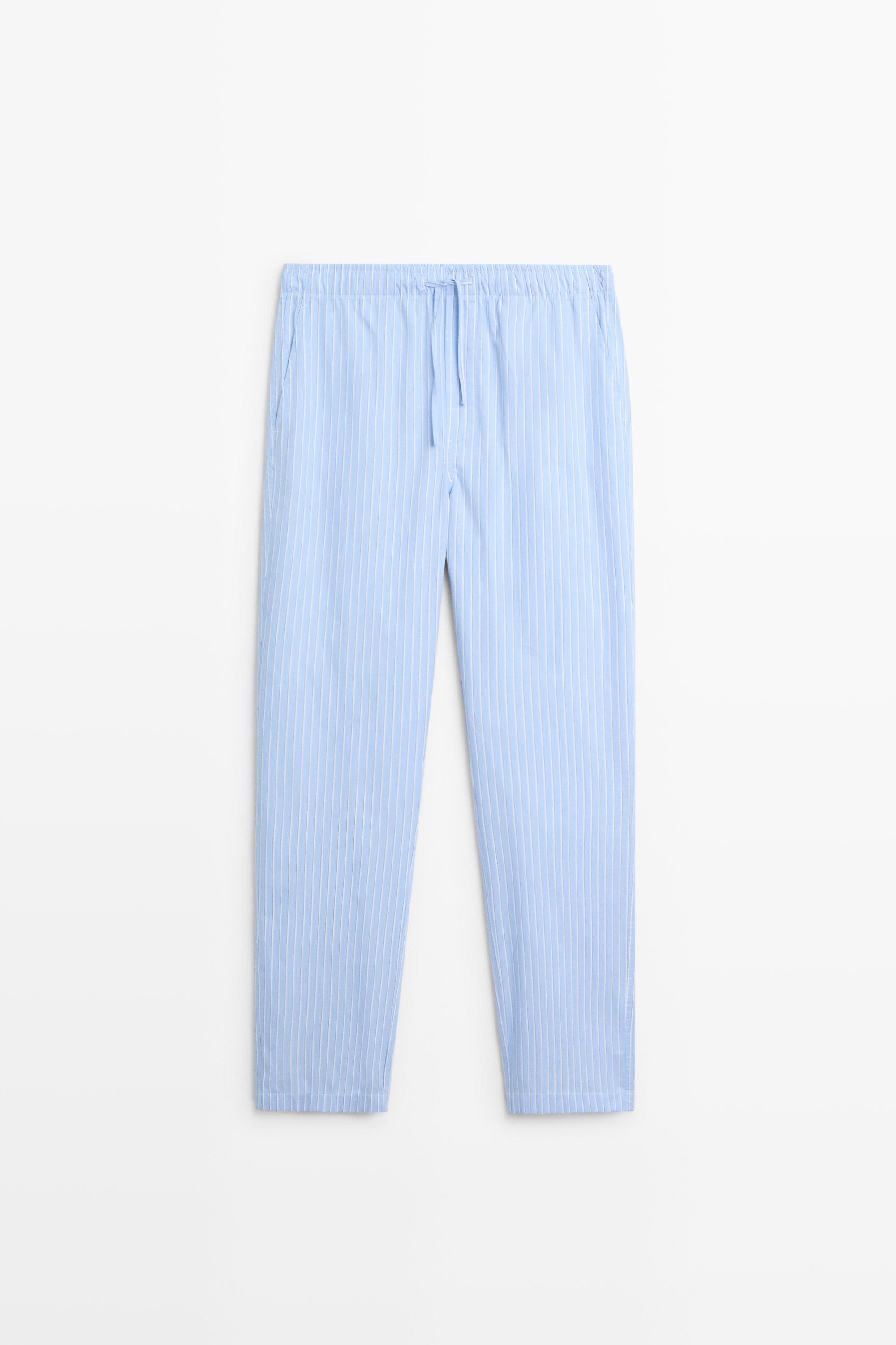 Short sleeve pyjama top and striped trousers